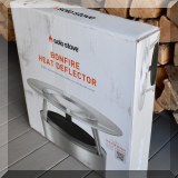 L03. Solo stove heat deflector. 